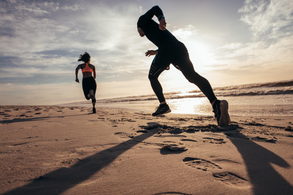 Atlantik Body Care Ireland, Two Athletes Running on Beach, Natural Skin Care